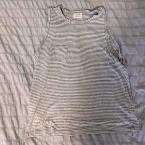 A gray, white stripped flowy tank top